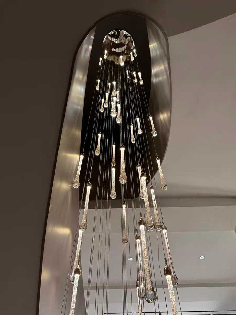 Sleek gold angel tears crystal chandelier, cascading teardrop design for staircase foyer entryway decor lighting,looking up 
