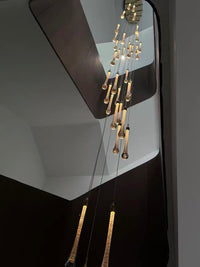 Thumbnail for Artistic gold angel tears crystal chandelier, cascading teardrop design illuminating staircase foyer with flair