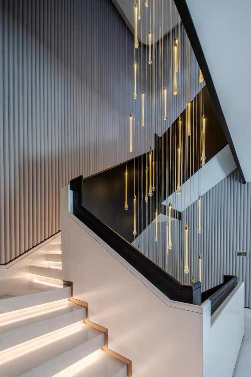 Contemporary gold angel tears crystal chandelier, cascading teardrop design for staircase foyer entryway lighting