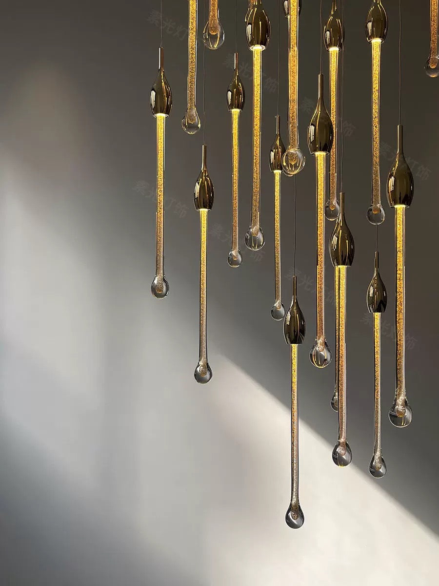 Contemporary gold angel tears crystal chandelier, cascading teardrop design for staircase foyer entryway illumination