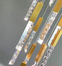 Thumbnail for 
Modern gold LED linear K9 crystal chandelier with a waterfall design, suitable for stairwells, foyers, and spaces with high ceilings. UL certified, with adjustable suspension wires.