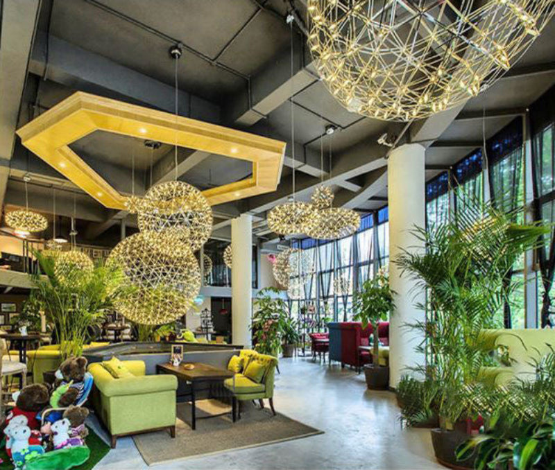 Modern chrome-plated LED chandelier with a starburst dandelion design, suitable for shopping malls.