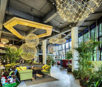 Thumbnail for Modern chrome-plated LED chandelier with a starburst dandelion design, suitable for shopping malls.