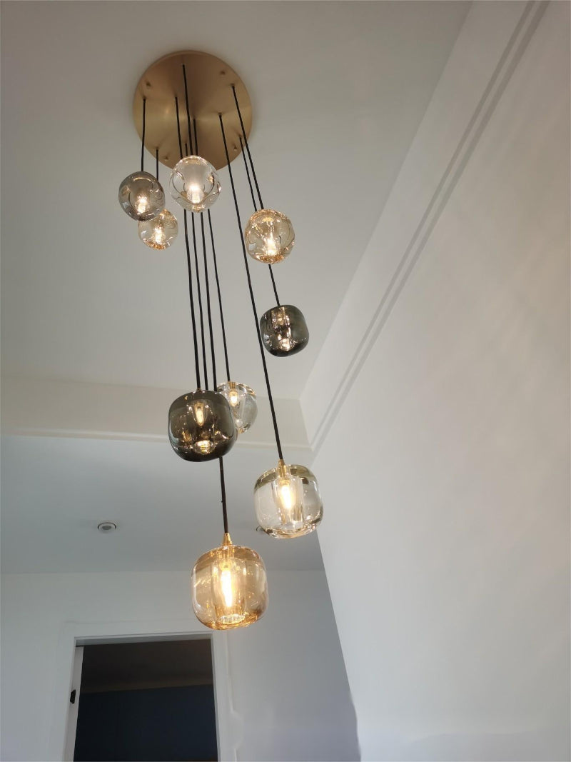 Square crystal chandelier with a spiral design, suitable for modern lighting in spaces such as stairwells, foyers, entrances, and rooms with high ceilings.