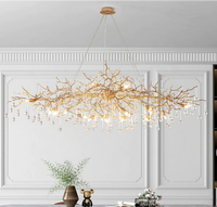 Thumbnail for Gold branch chandelier in dining room, hand-forged design with K9 water drop crystals for modern interior lighting