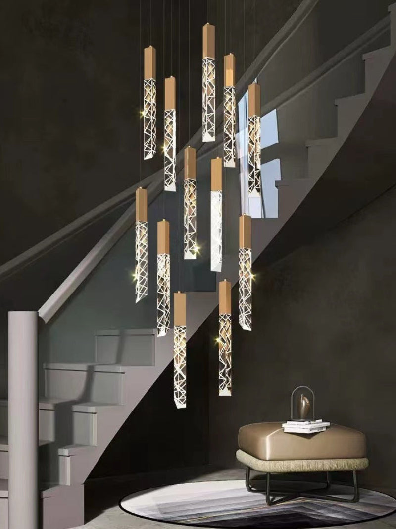 Modern gold LED linear K9 crystal chandelier, featuring a waterfall design, suitable for stairwells, foyers, and spaces with high ceilings.