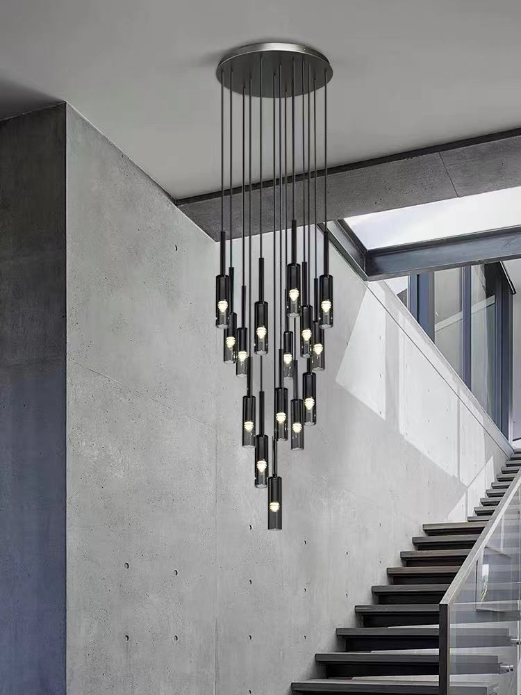 Black creative chandelier with linear wire pendant and Italian copper creating sophisticated lighting for modern dining room foyer