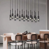Thumbnail for Modern dining room chandeliers featuring linear wire pendant in black with Italian copper for contemporary dining room lighting