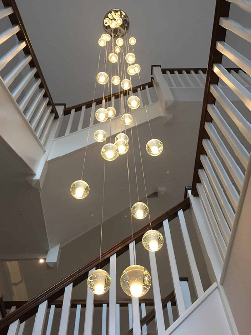 UL-certified bubble crystal chandelier viewed from below showing random floating orb arrangement with dimmable LED for stairwell void