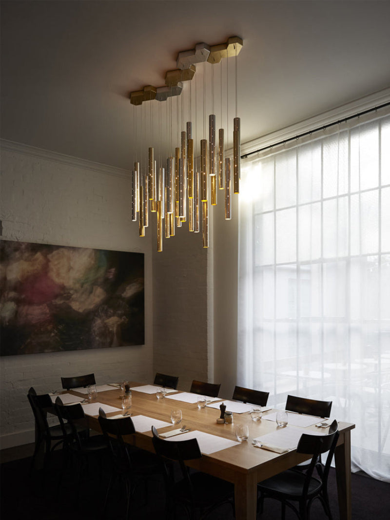 Modern minimalist cylinder pendant with silver meteor shower design and perforated tubes for dining room kitchen island 4-42 lights