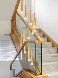 Thumbnail for Designer round wood chandelier with linear shape pendant in Japanese style creating minimalist lighting for modern dining room foyer