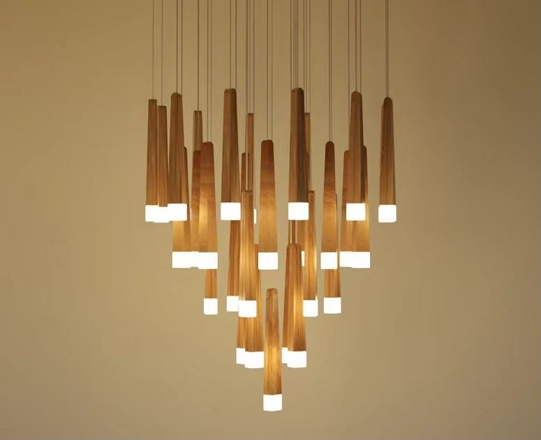 Linear shape pendant chandelier featuring round wood in Japanese style creating elegant lighting for modern dining room foyer