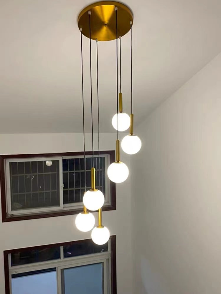Modern LED glass pendant featuring unique bubble ball creative staircase chandelier for foyer entryway contemporary high ceiling