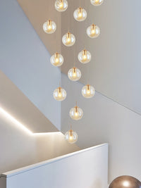Thumbnail for Pendant chandelier with handcrafted textured bubble spheres creating visual depth for entryway foyer high ceiling