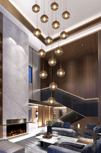 Thumbnail for Elegant Venetian-inspired bubble chandelier with sculptural concave-convex glass for warm ambient foyer lighting