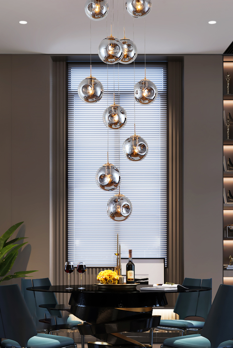 Artisan glass globe chandelier featuring dimensional bubble spheres with textured surface for staircase entryway