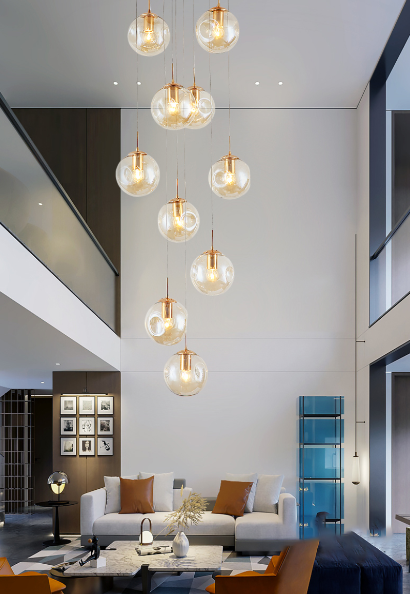 Cascading bubble chandelier with handcrafted Murano-style glass in light yellow for two-story foyer entryway lighting installation