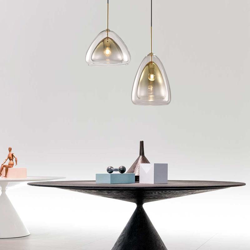 Simple glass bubble chandelier with modern geometric pendant light creating elegant lighting for dining room kitchen island