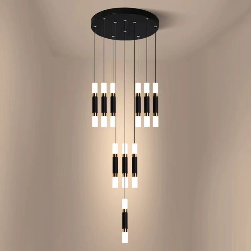 Spiral crystal chandelier with staircase design and foyer pendant creating brilliant lighting for entryway two-story ceiling