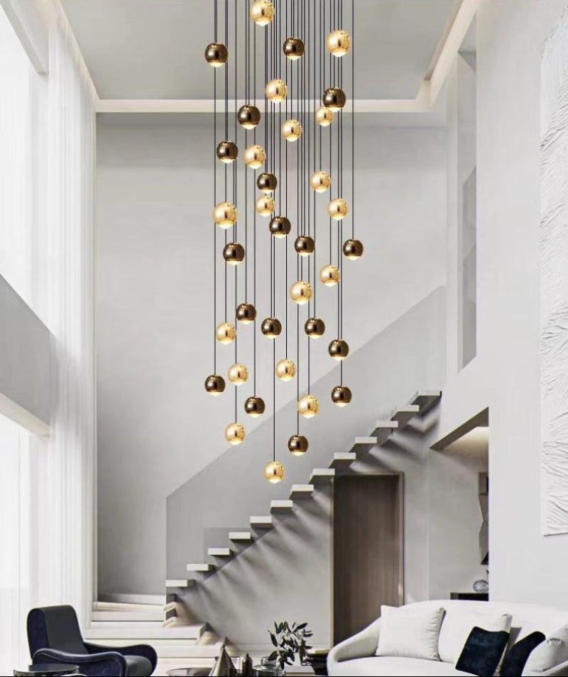 Bubble cluster chandelier with cognac glass bronze truffle design creating warm sparkle for foyer staircase entryway lighting
