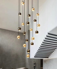 Thumbnail for Modern foyer chandelier with cognac glass bronze truffle clusters creating luxurious ambiance for staircase entryway lighting