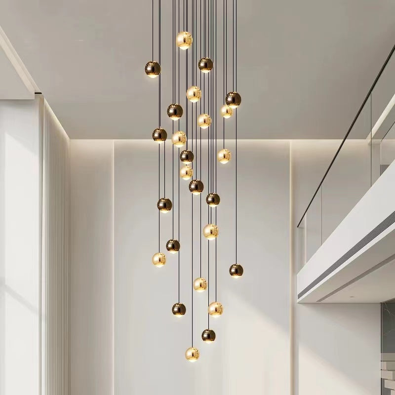 Ceiling fixture featuring cognac glass bronze truffle clusters with aluminum frame for modern foyer staircase two-story space