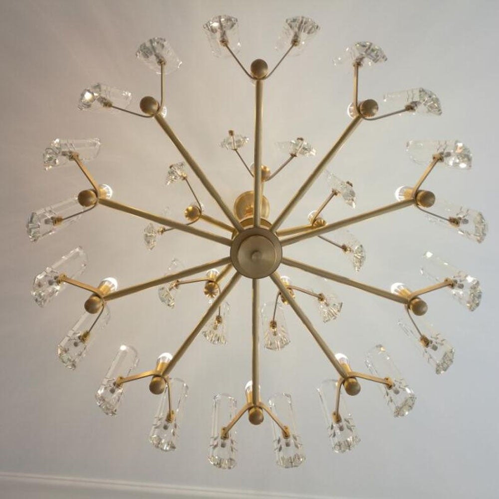 Modern crystal chandelier lights featuring Candlestick Elegance design with candle-style arms for contemporary dining room entryway