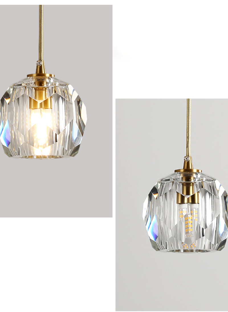 High-end crystal ball chandelier with sharp-edge facets creating mesmerizing ambiance for luxury staircase foyer hotel lobby