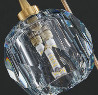 Thumbnail for Premium crystal ball chandelier with faceted cut creating captivating light dance for modern staircase foyer high ceiling