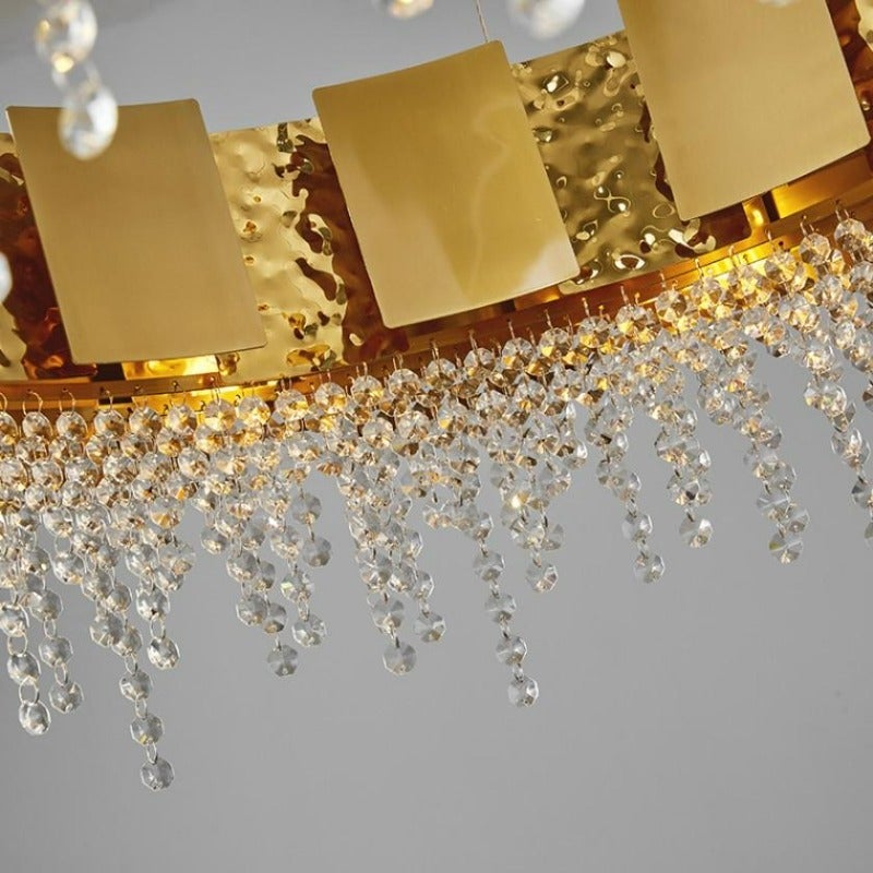 Modern gold crystal chandelier with adjustable height and tassel design creating timeless sophistication for dining room bedroom