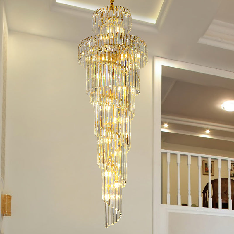 Elegant K9 crystal spiral chandelier with modular design creating brilliant illumination for grand staircase foyer hotel lobby