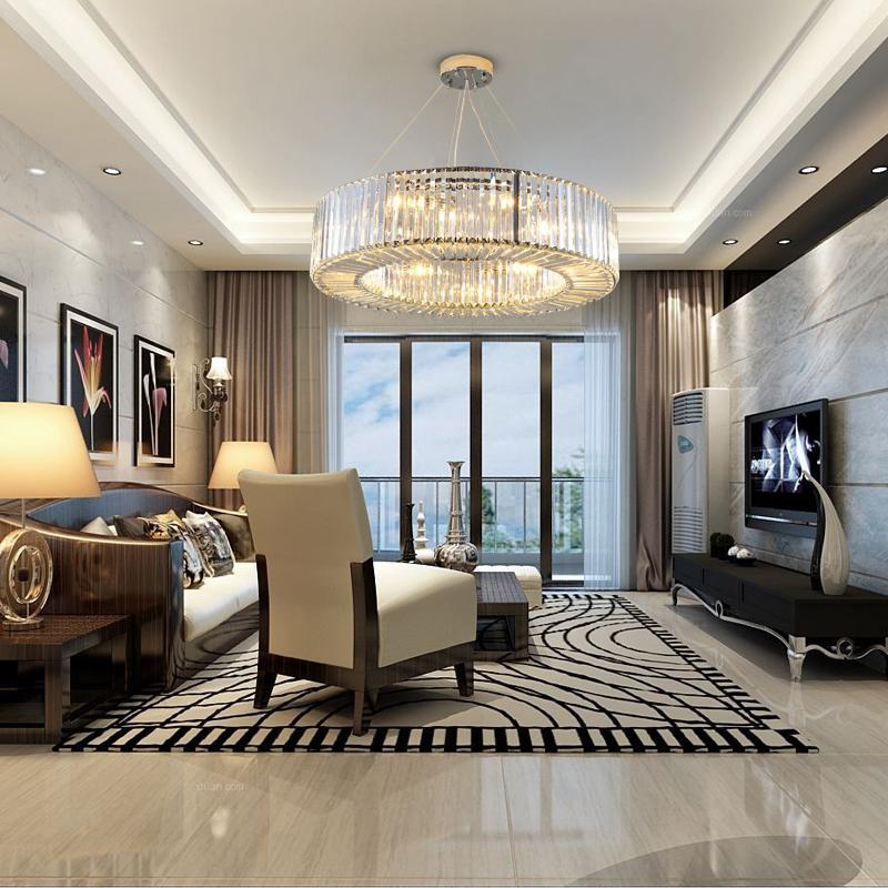 Chrome crystal chandelier with unique circular design and adjustable height creating stunning display for modern foyer living room