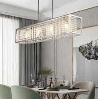 Thumbnail for Linear gold K9 crystal chandelier with encapsulated design creating sophisticated atmosphere for elegant dining room foyer