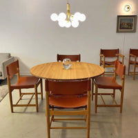 Thumbnail for Bubble chandelier featuring Flower Bloom American ball design with floral arrangement for elegant dining room foyer high ceiling