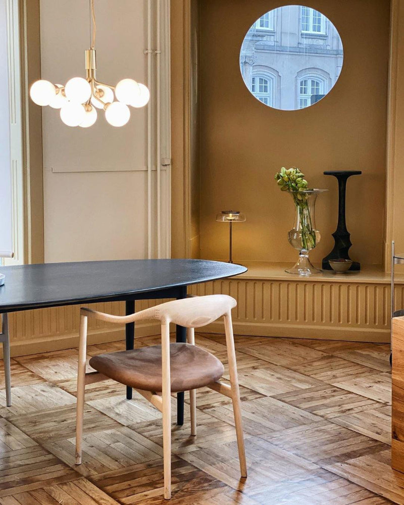 Dining chandelier with Flower Bloom American bubble ball design creating sophisticated ambiance for modern dining room table