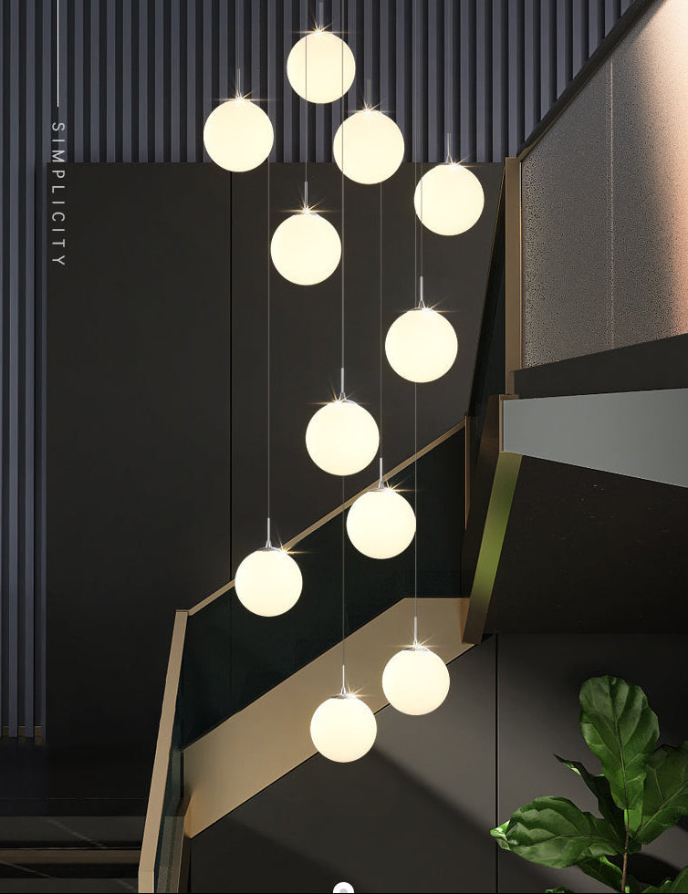 Modern bubble ball chandelier featuring Frosted Cascade design with frosted glass for dining room foyer contemporary lighting