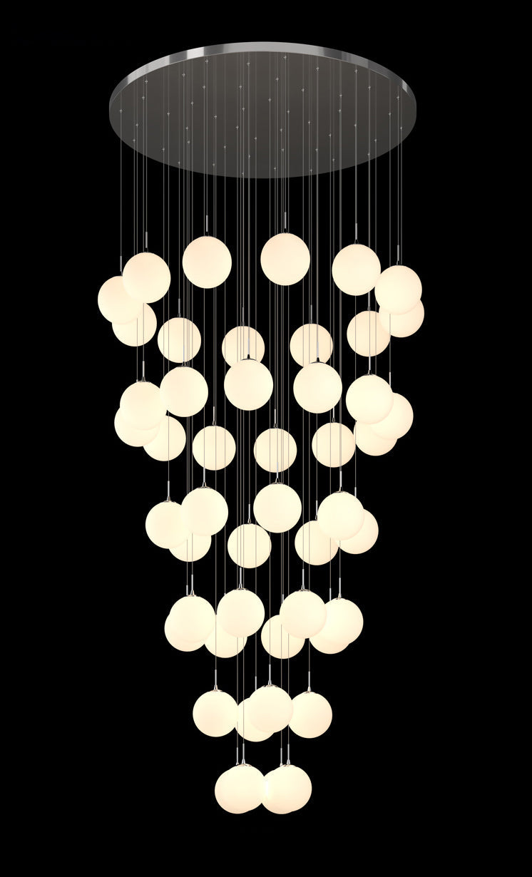 Frosted glass cascade chandelier featuring bubble ball design creating elegant lighting for modern dining room foyer