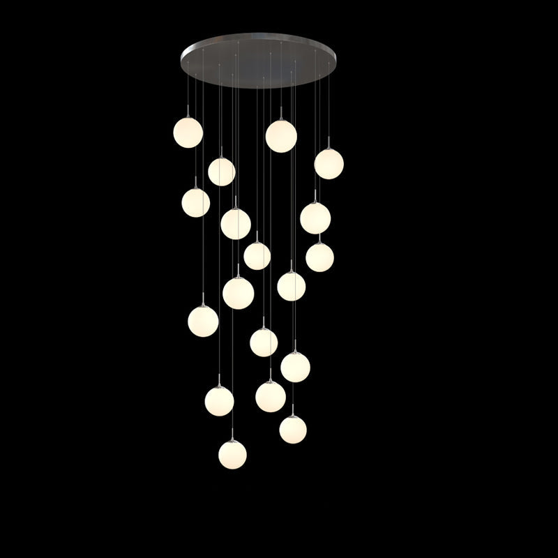 Frosted Cascade bubble chandelier with cascading balls creating elegant lighting for modern dining room foyer entryway