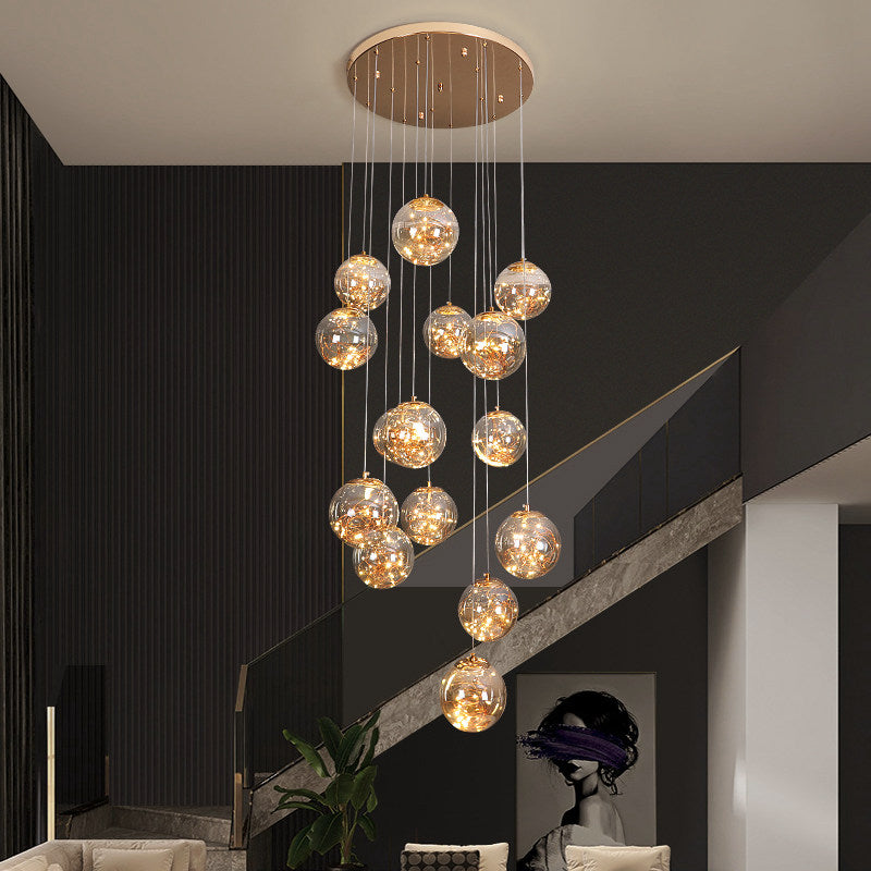 Bubble ball art chandelier with firefly-inspired lighting creating magical atmosphere for staircase foyer two-story high ceiling