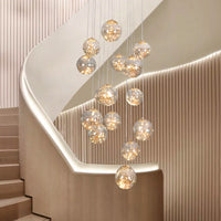 Thumbnail for Glass bubble light fixture with firefly-inspired design creating poetic experience for modern staircase foyer entryway high ceiling