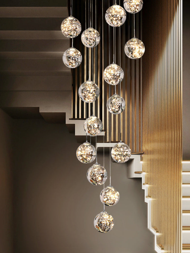 Elegant glass bubble chandelier with firefly-inspired design creating sophisticated ambiance for staircase foyer entryway lighting