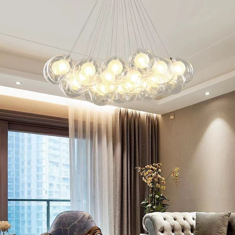 Bubble glass chandelier with adjustable height and G4 LED creating versatile lighting for living room dining room foyer