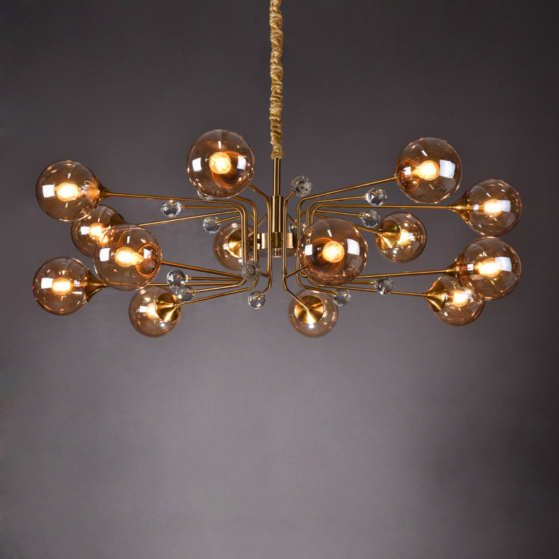 Wrought iron chandelier featuring clear glass ball and Iron Bubble crystal design for elegant dining room foyer entryway