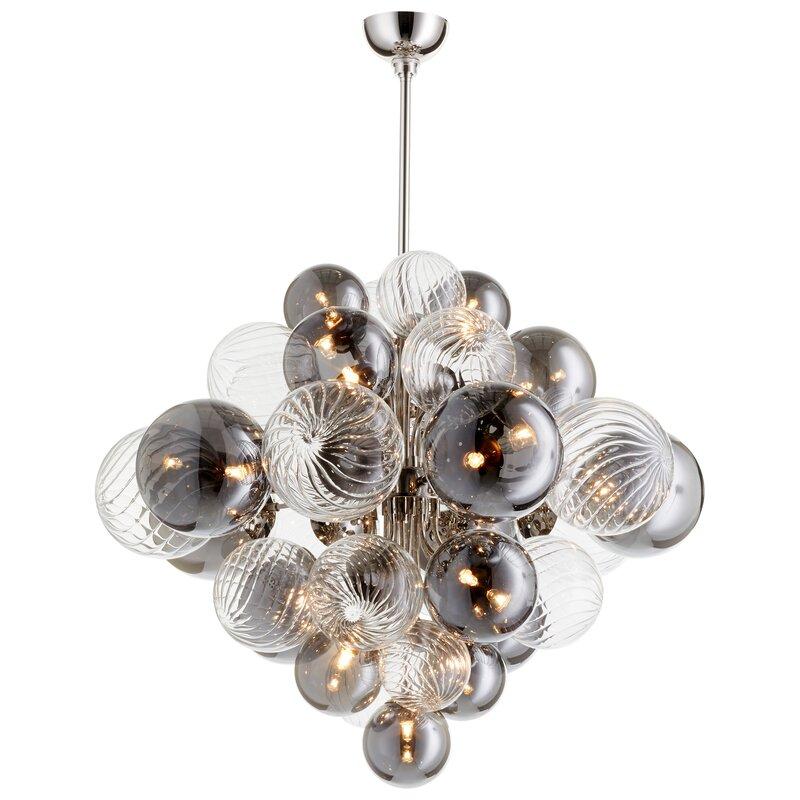 Sputnik bubble chandelier with clear and smoky glass creating magical dancing light for contemporary dining room foyer