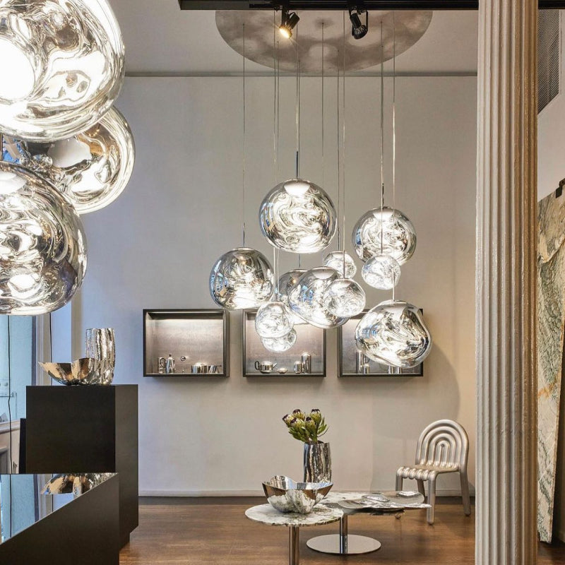 Modern interior with hanging glass pendant lights in a stylish room.