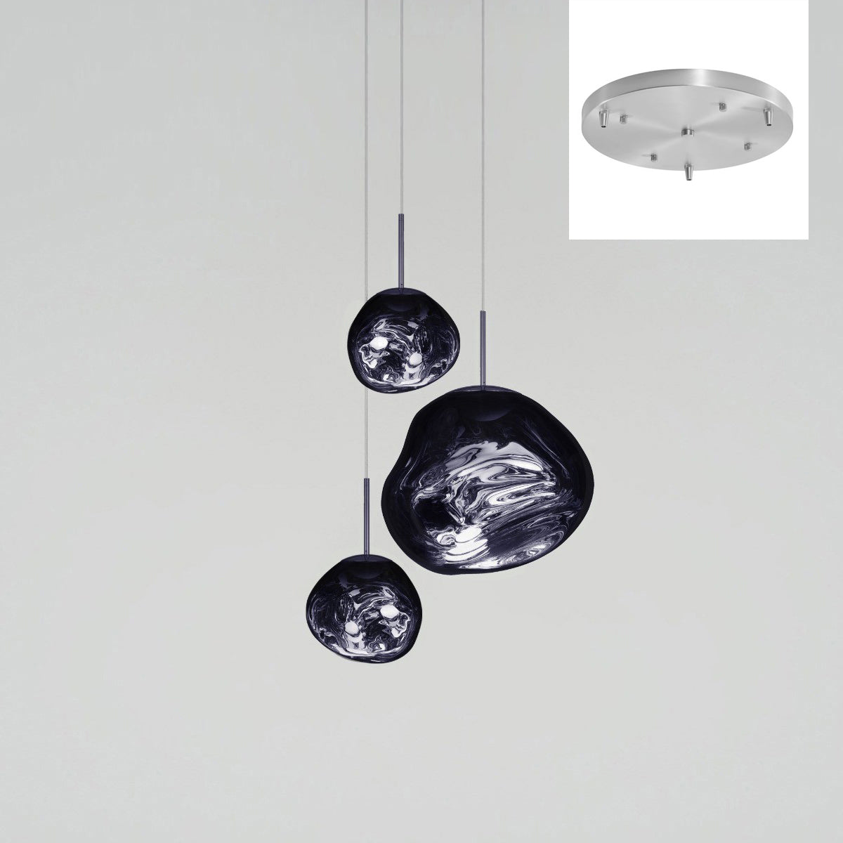 A group of spherical lighting fixtures with a metallic finish suspended from a ceiling canopy, designed to provide ambient lighting.UL