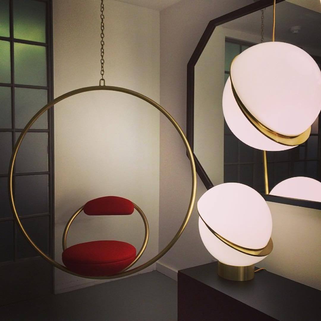 Opal sphere crescent chandelier with Moon Hemisphere design creating artistic celestial ambiance for dining room living room