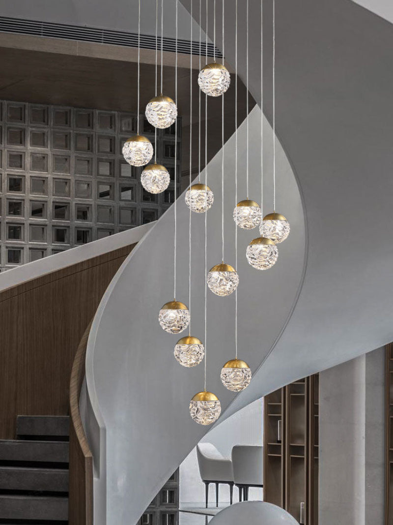 Pineapple Glow bronze art chandelier with irregular glass balls creating artistic elegance for grand foyer staircase living room