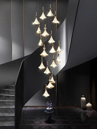 Thumbnail for Shell Cascade stainless steel staircase chandelier with cascading design creating elegant lighting for foyer entryway high ceiling