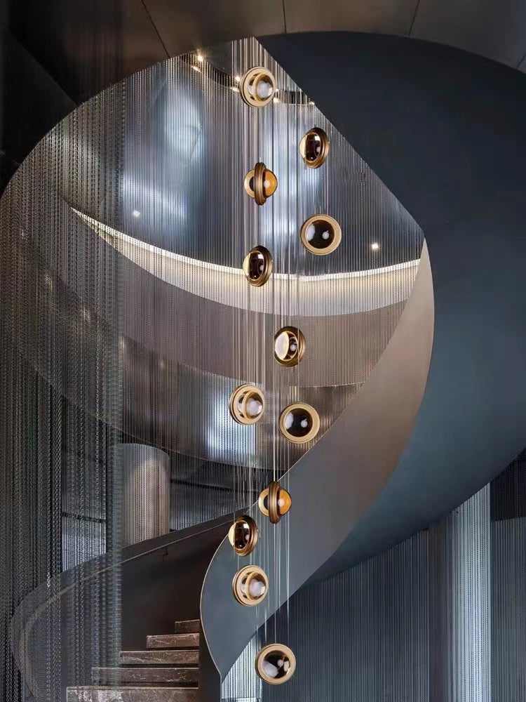 Staircase chandelier crystals with Star Light Bubbles design creating brilliant lighting for foyer entryway high ceiling